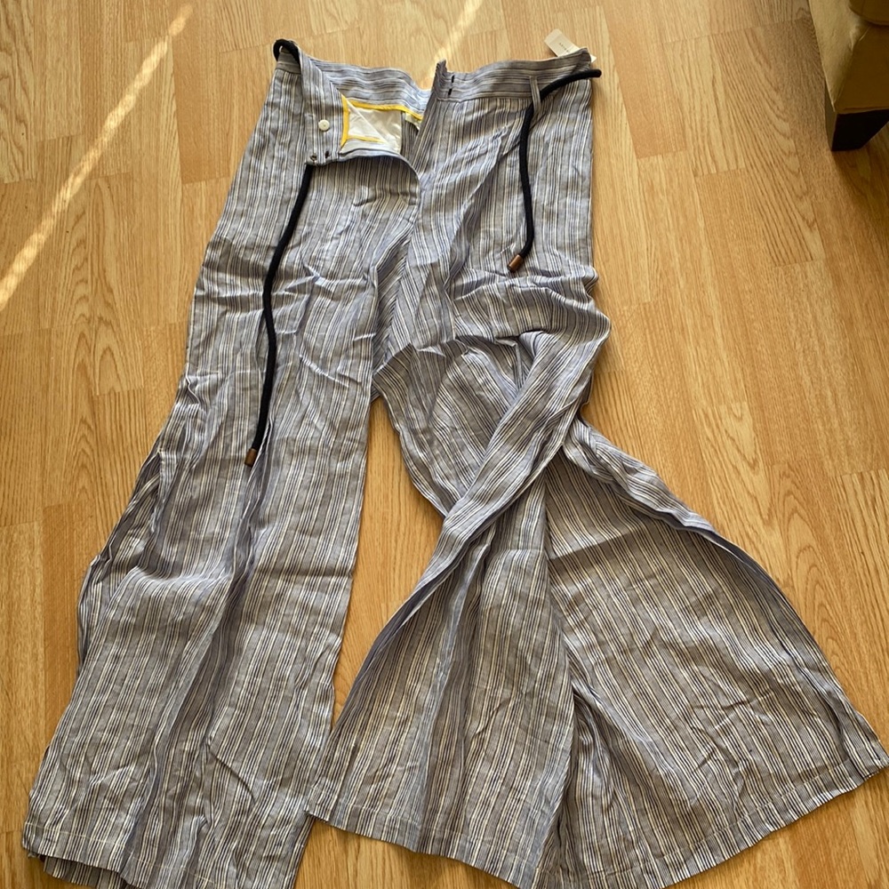 Blue and white stripped, flow-ey beach pants! Thick strings tie around waste